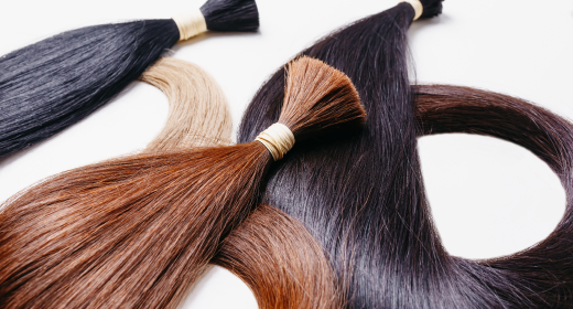 hair extensions of three colors on a white backgro