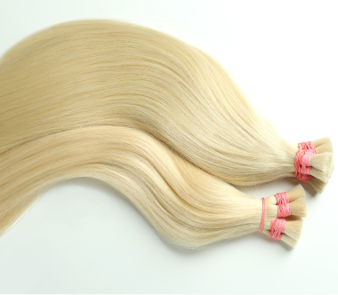 strands of blond hair on white background 2023 11 27 05 30 10 utc 1